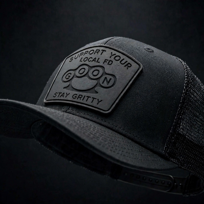 Closeup Black on black GOON Support Your Local FD Richardson 112 trucker hat , black on black murdered out silicone patch Firefighter