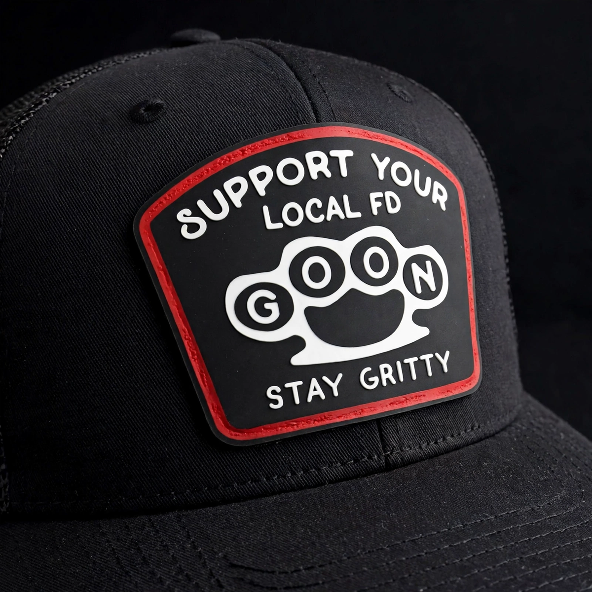 close up on support your local fd goon firefighter trucker hat