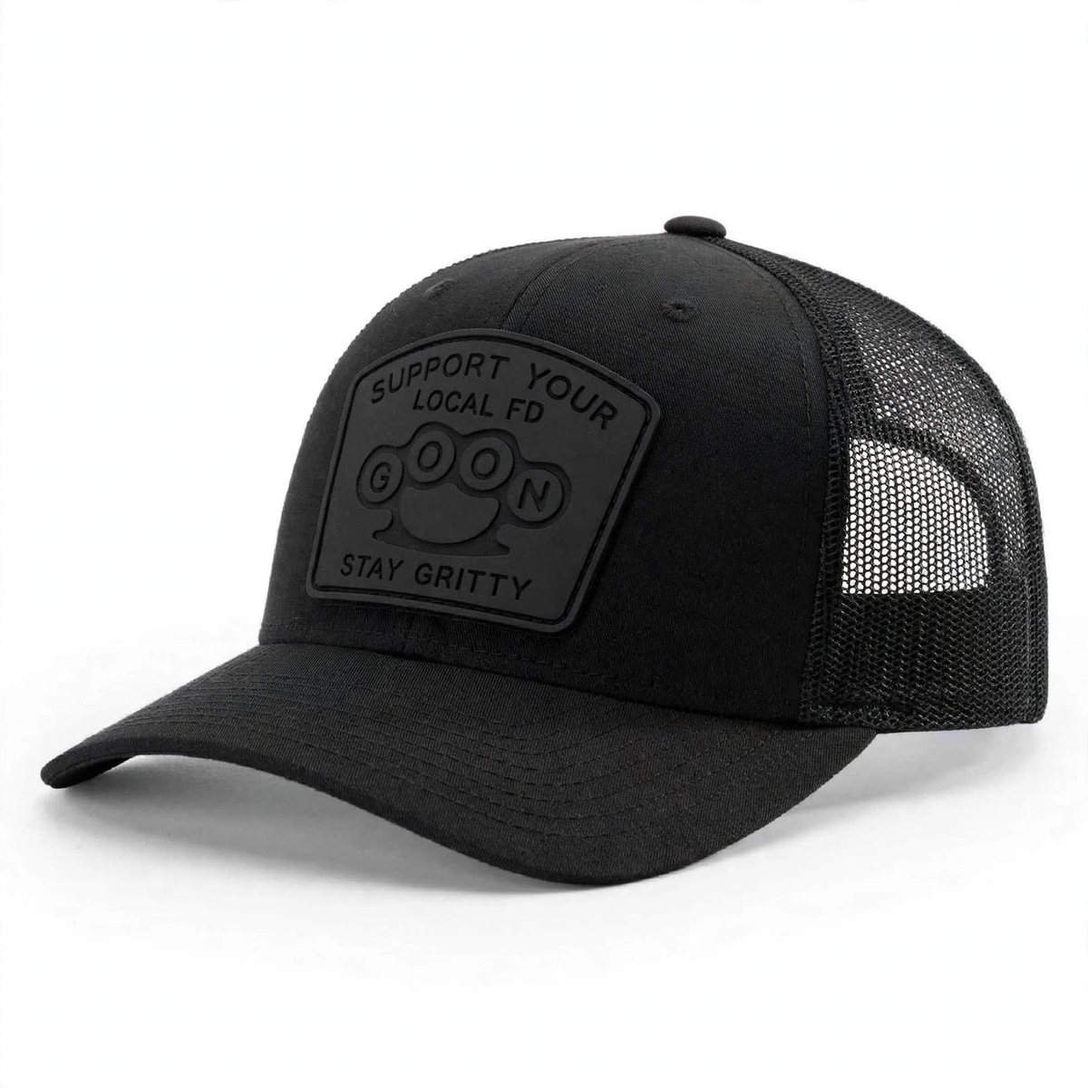 Blackout lifestyle alt: Man wearing blackout GOON Support Your Local FD Richardson 112 trucker hat driving vintage Ford truck, black on black murdered out silicone patch Firefighter Gift